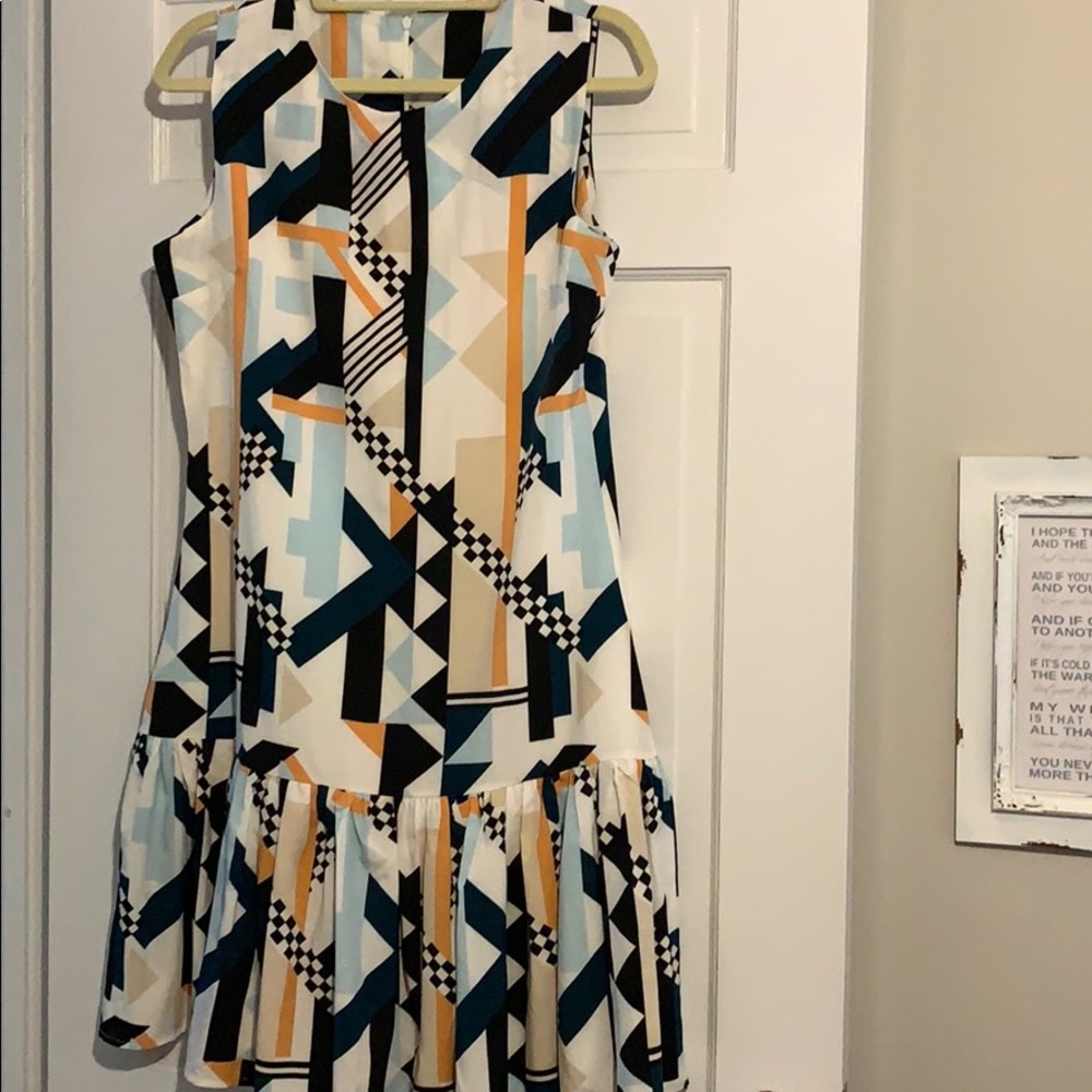 Printed sleeveless dress with ruffle bottom